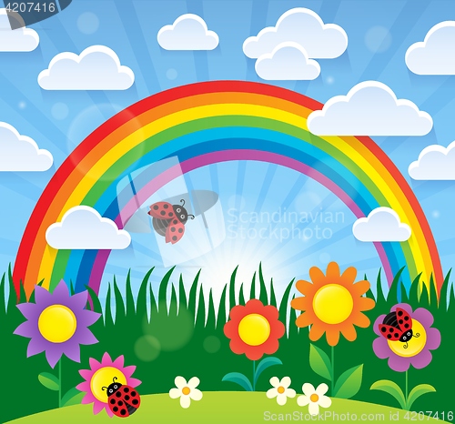 Image of Spring theme with flowers and rainbow