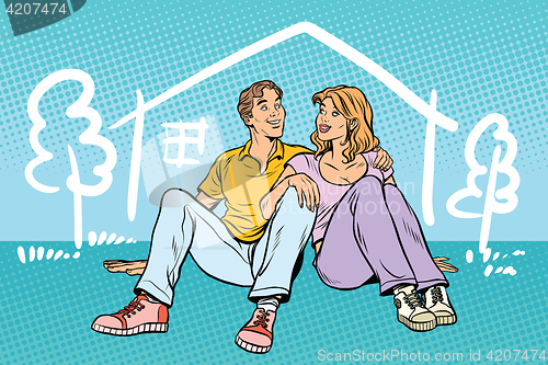 Image of Young couple boy and girl dreams about the house