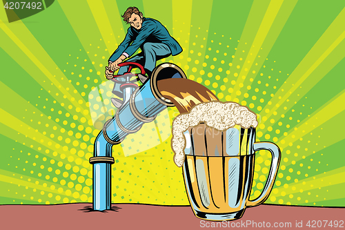 Image of Man pours beer