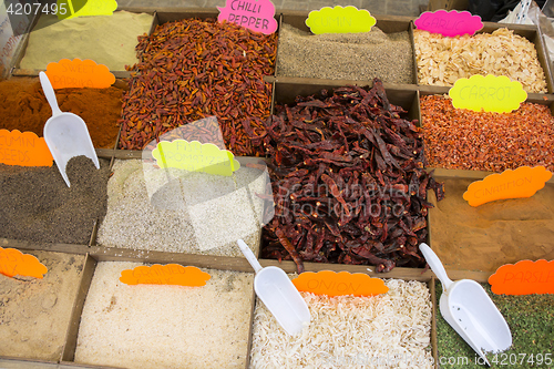 Image of Dried vegetables and spices on a street market