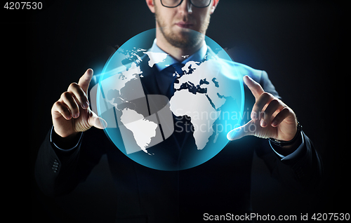 Image of close up of businessman with earth projection