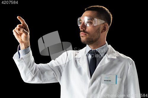 Image of doctor or scientist in lab coat and safety glasses