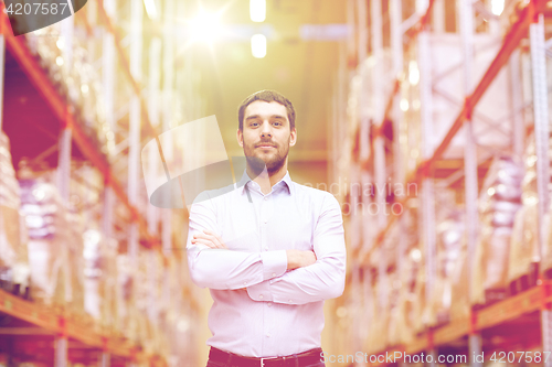 Image of happy man at warehouse