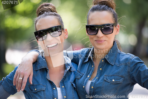 Image of twin sister with sunglasses