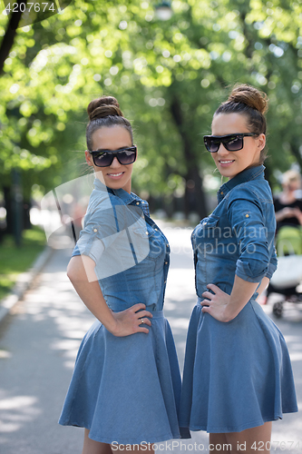 Image of twin sister with sunglasses