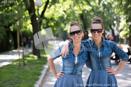 Image of twin sister with sunglasses