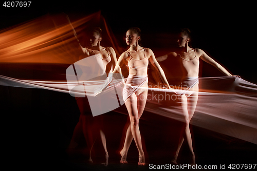 Image of The sensual and emotional dance of beautiful ballerina