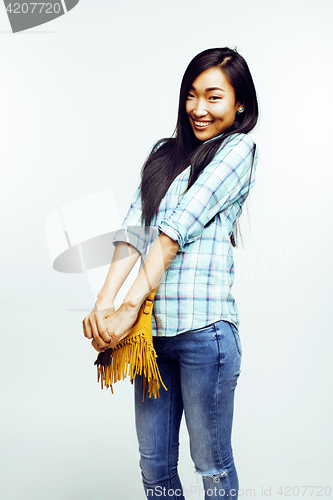 Image of young pretty asian woman posing cheerful emotional isolated on white background, lifestyle people concept