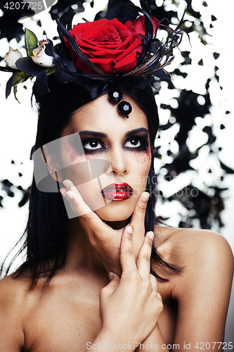 Image of pretty brunette woman with rose jewelry, black and red, bright m