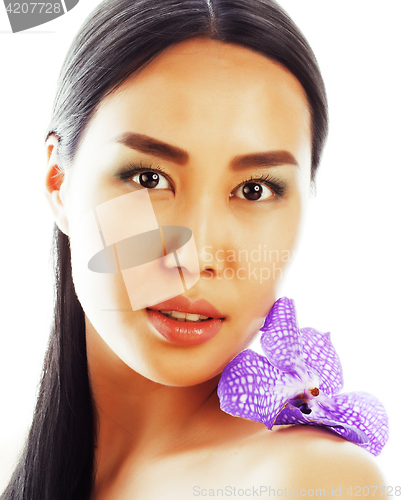 Image of young pretty asian woman with flower orchid close up isolated sp