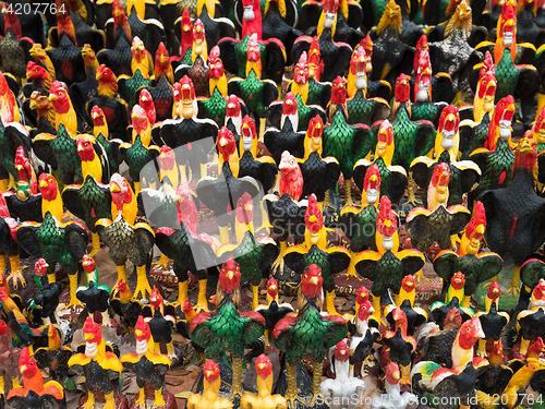 Image of Rooster figurines in Thailand