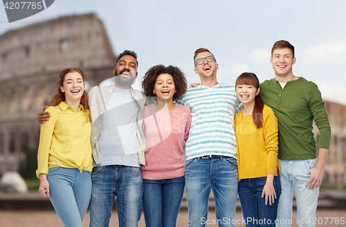 Image of international group of happy people over coliseum