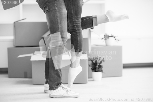 Image of happy Young couple moving in new house