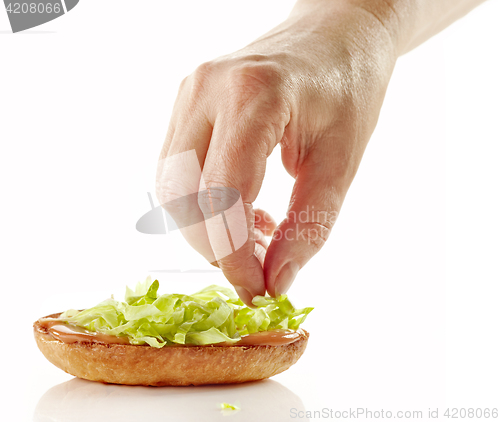 Image of process of making burger