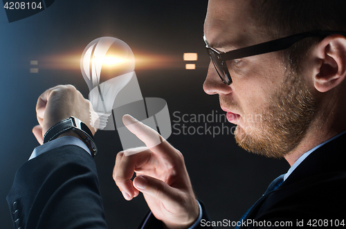 Image of close up of businessman with smart watch