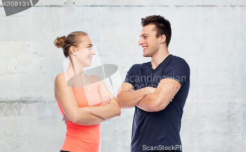 Image of happy sportive man and woman