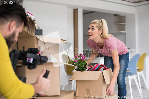 Image of girl moving in the new apartment