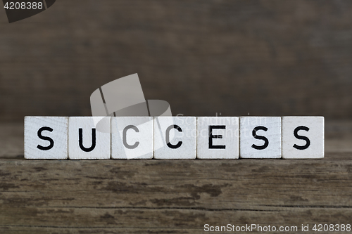 Image of Success, written in cubes