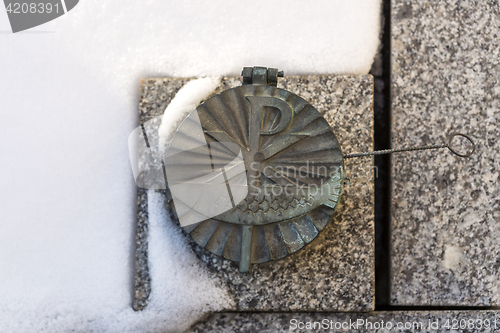 Image of Holy water shell at the grave