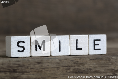 Image of Smile, written in cubes