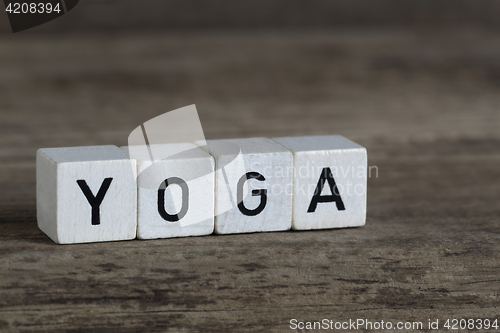 Image of Yoga, written in cubes    