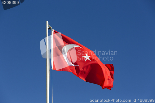 Image of National flag of Turkey on a flagpole