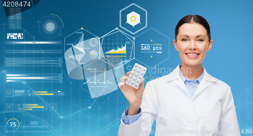 Image of happy doctor over blue background and charts