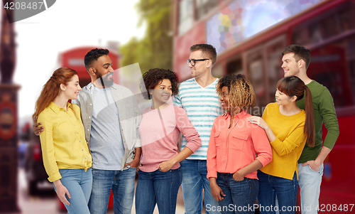 Image of international group of happy people in london