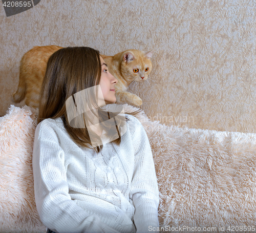 Image of Girl and red cat