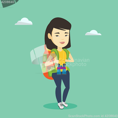 Image of Cheerful traveler with backpack.