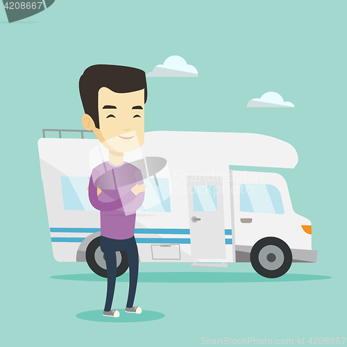 Image of Man standing in front of motor home.