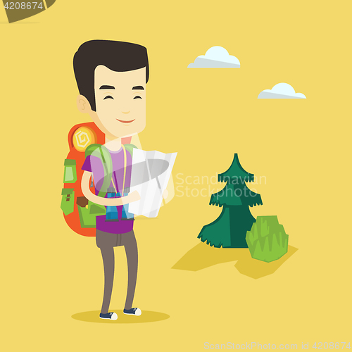Image of Traveler with backpack looking at map.