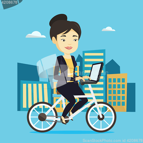 Image of Woman riding bicycle in the city.