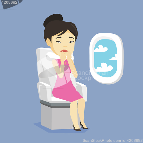 Image of Young woman suffering from fear of flying.