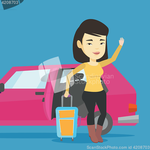 Image of Young asian woman traveling by car.