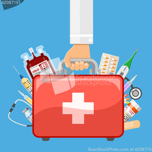 Image of first aid kit in doctor hand