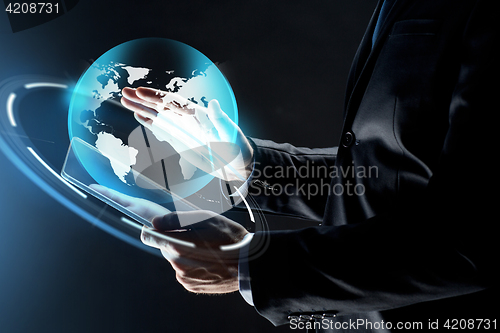 Image of close up of businessman with transparent tablet pc