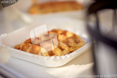 Image of close up of waffle on paper plate