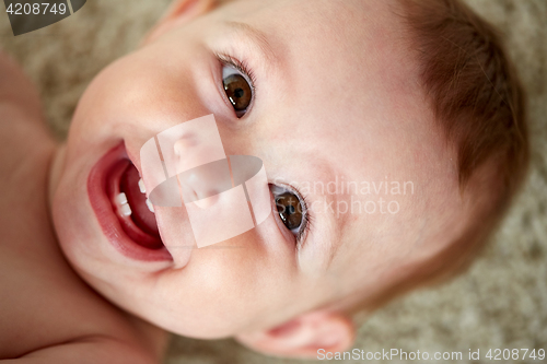 Image of close up of happy little baby boy or girl face