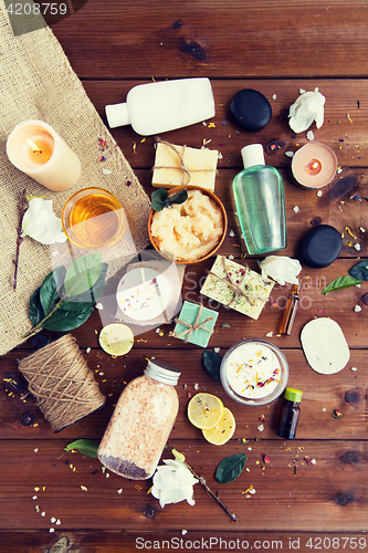 Image of close up of body care cosmetic products on wood