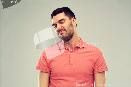 Image of man wrying over gray background