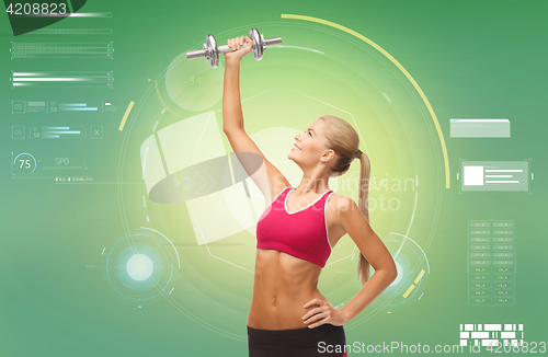 Image of happy sporty woman with dumbbells flexing biceps