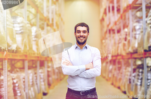 Image of happy man at warehouse