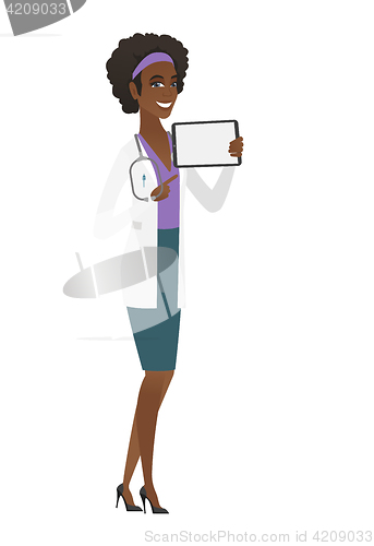Image of Smiling doctor holding tablet computer.