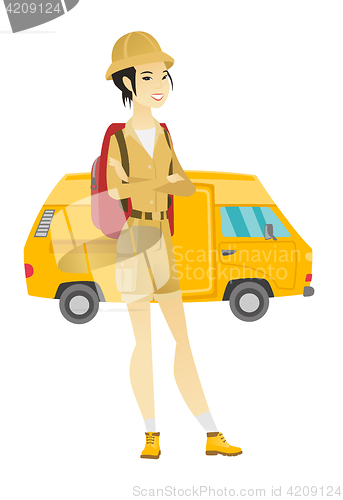 Image of Traveler standing on the background of minibus.