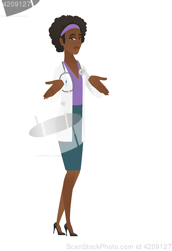 Image of African confused doctor shrugging shoulders.