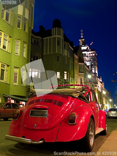 Image of Classic Car parked on Night Street