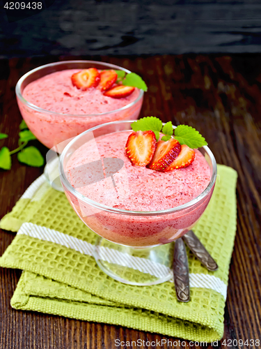 Image of Jelly air strawberry in bowl on dark board