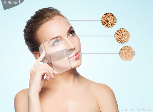 Image of beautiful young woman face with dry skin sample