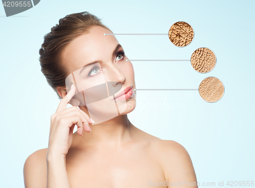 Image of beautiful young woman face with dry skin sample